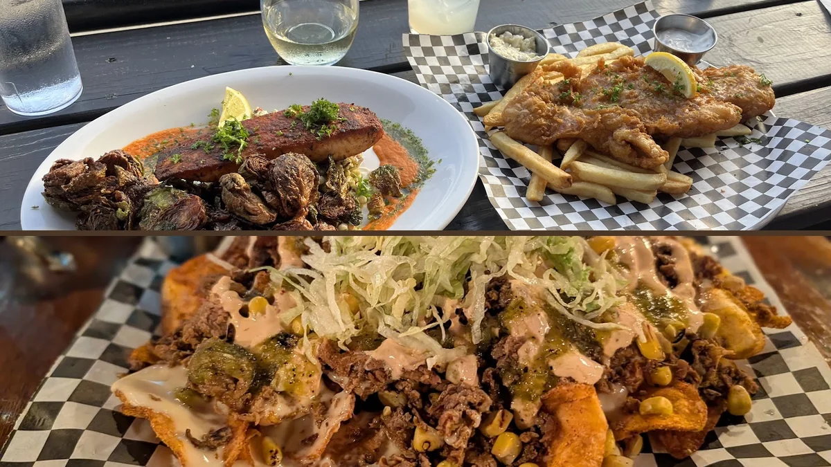 Drinks, plates, and relaxed seating inside a Rock Hill bar.